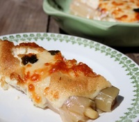 Puerros gratinados con alioli y queso curado